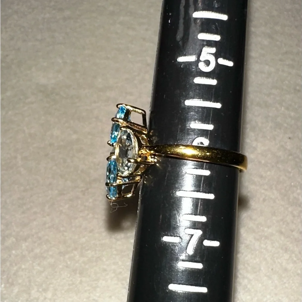 Uniquely set 4 stone Blue Topaz Gemstone Ring
